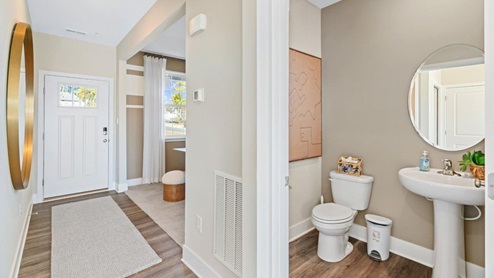 Penwell entry way with half bath