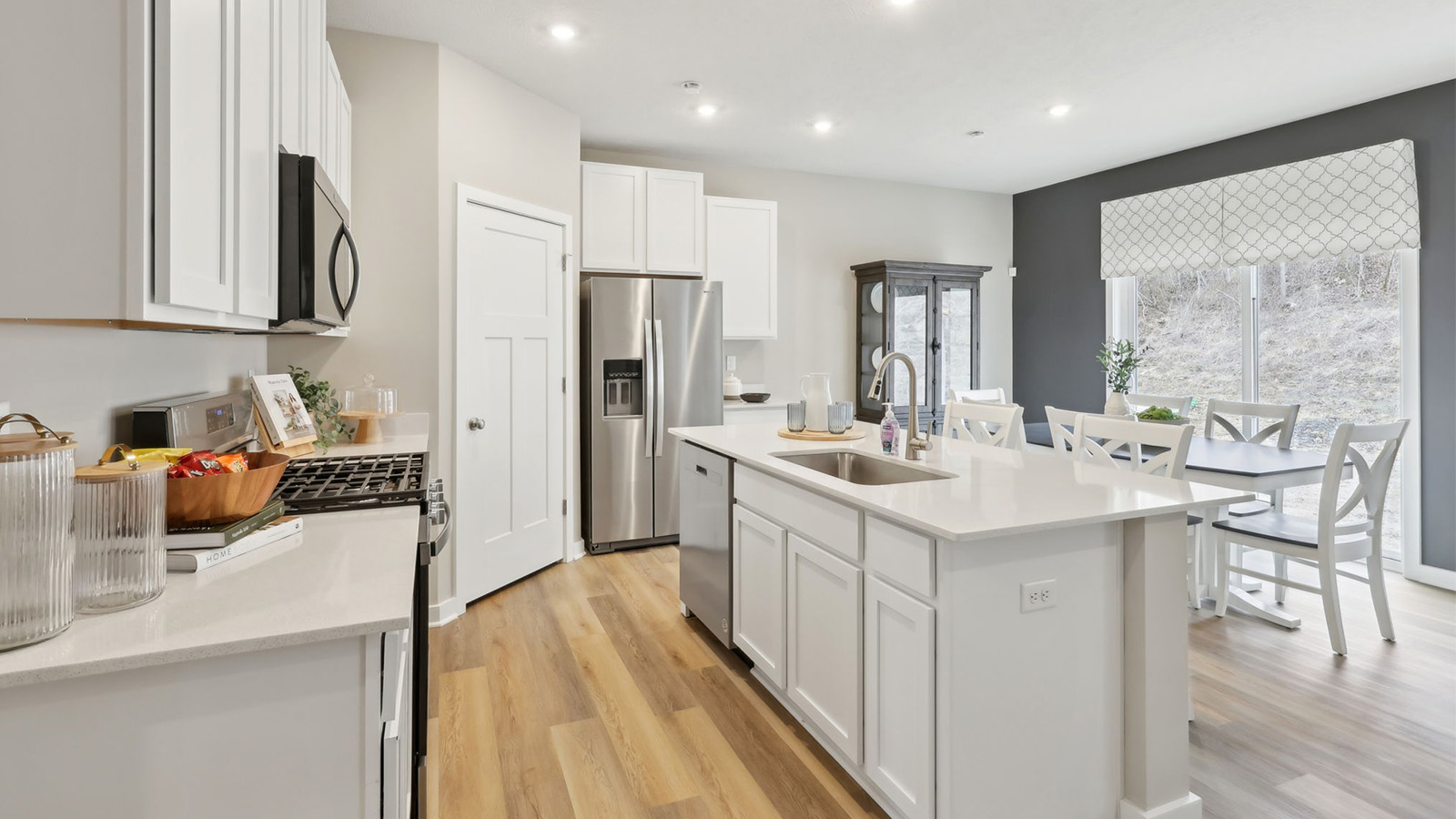 kitchen with large island and quartz countertops