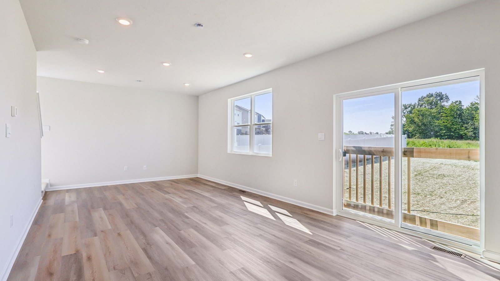 Living and dinette area with sliding glass door