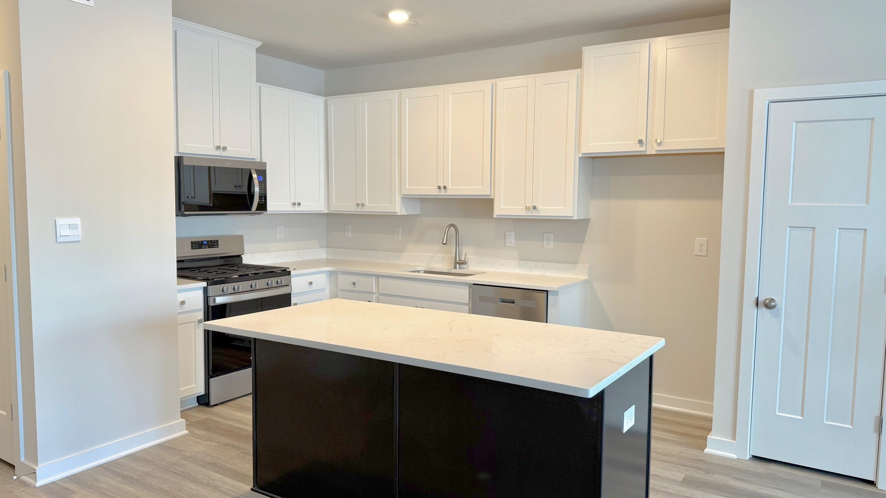 kitchen with white cabinets
