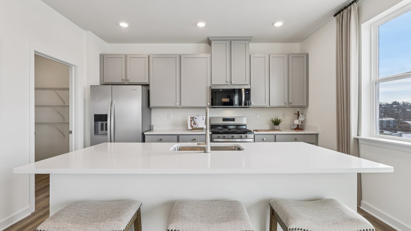 Kitchen with large island and pantry