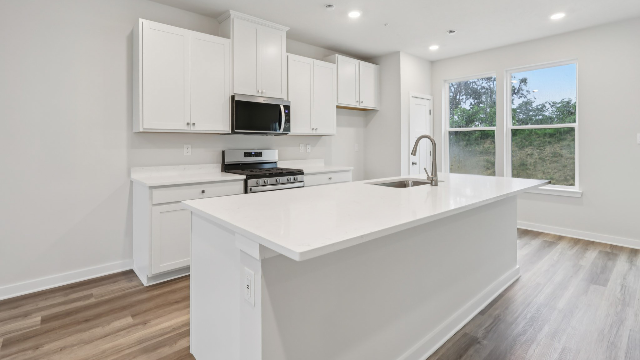 Kitchen with white cabinetry