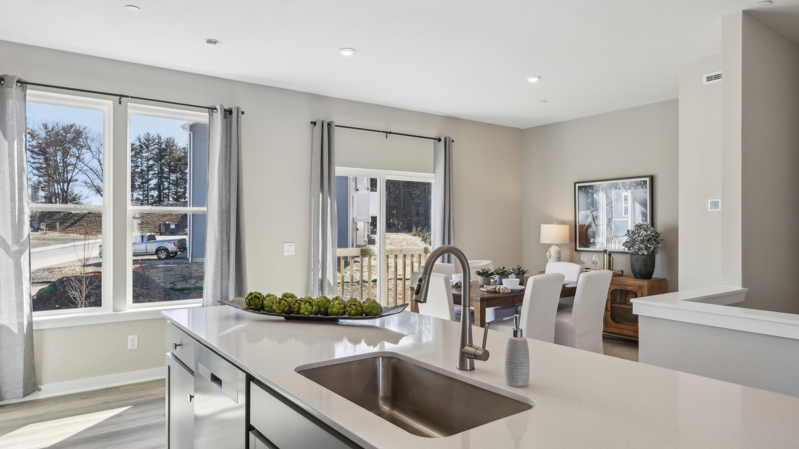 Kitchen with large window into dining area