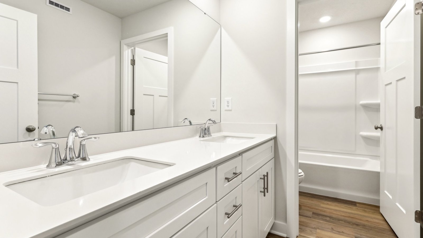 Secondary bathroom with double bowl vanity