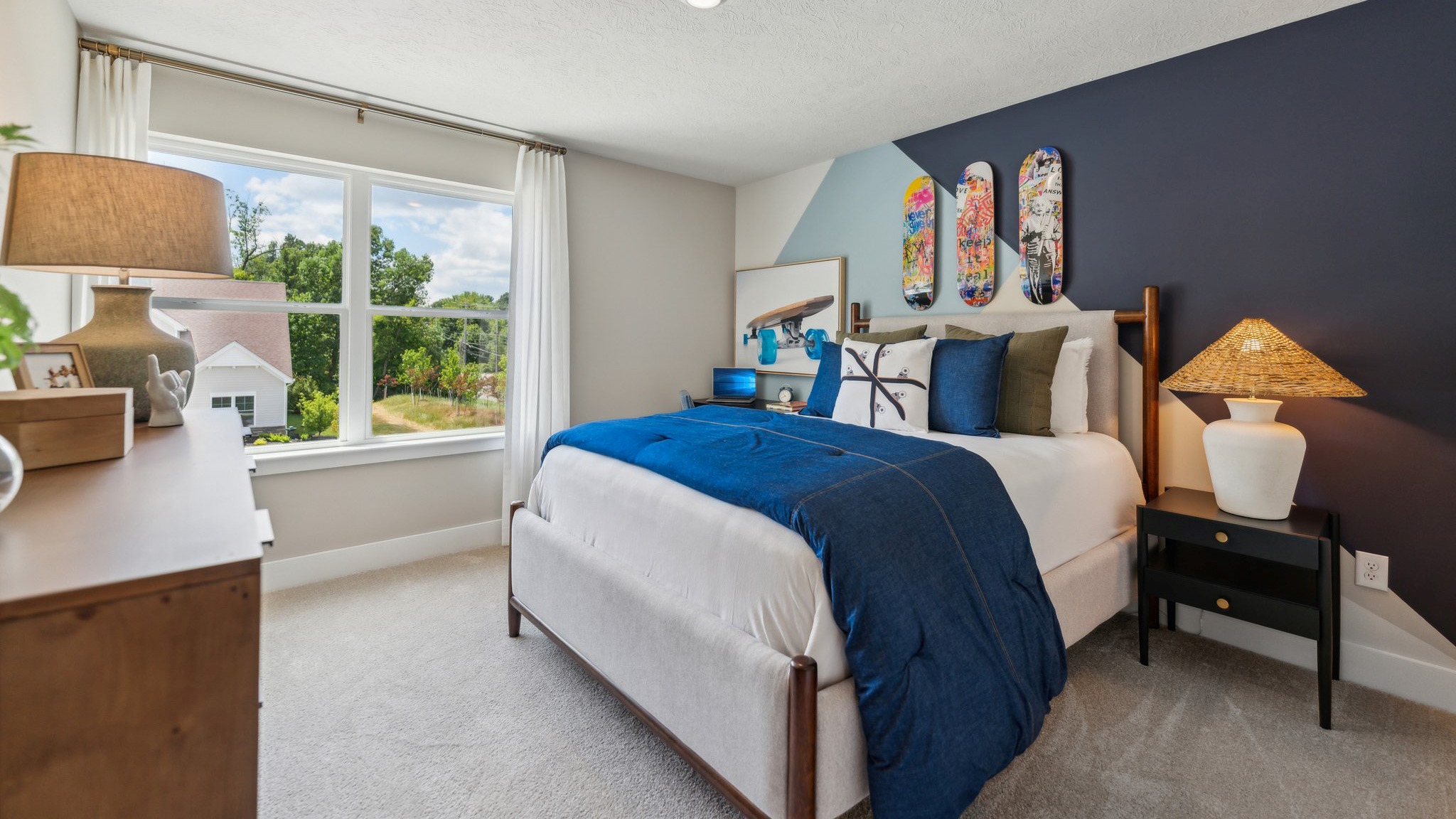 Smaller secondary bedroom with full bed