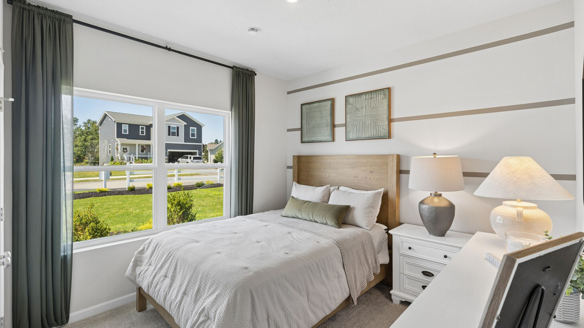Secondary bedroom with two large windows
