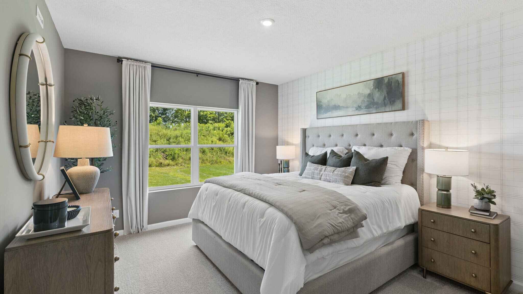 Primary suite with large windows