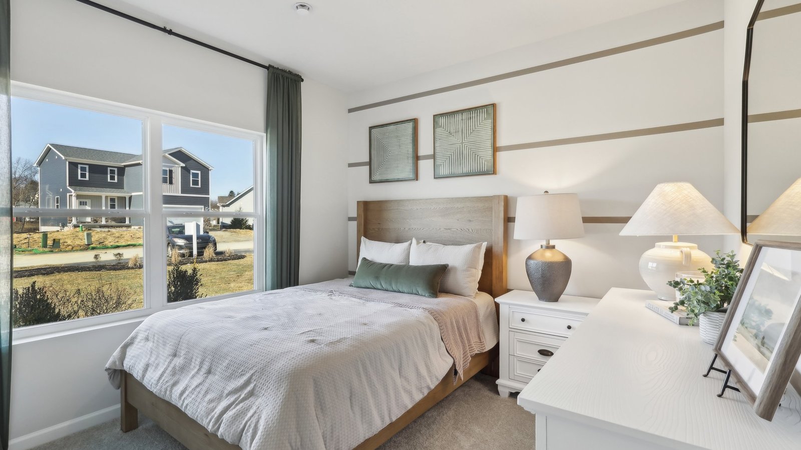 Secondary bedroom with large windows
