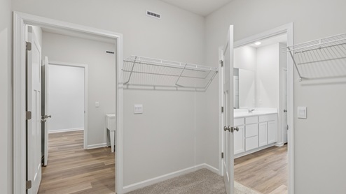 Primary walk-in closet