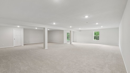 Finished lower level with sliding glass door