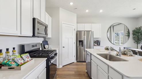 Kitchen with corner pantry