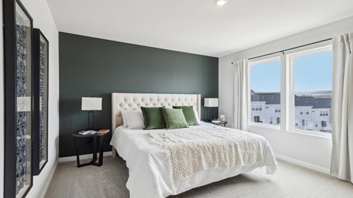primary suite with large windows