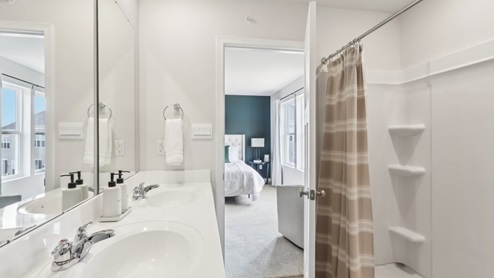 primary ensuite full bath with walk-in shower