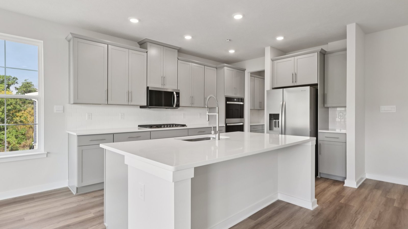 Kitchen with gray cabinets