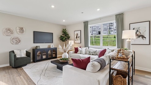Main level living area with windows