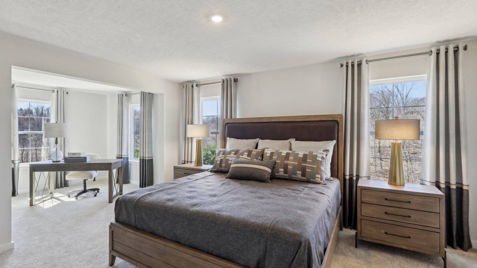 Primary bedroom with open room made into an office