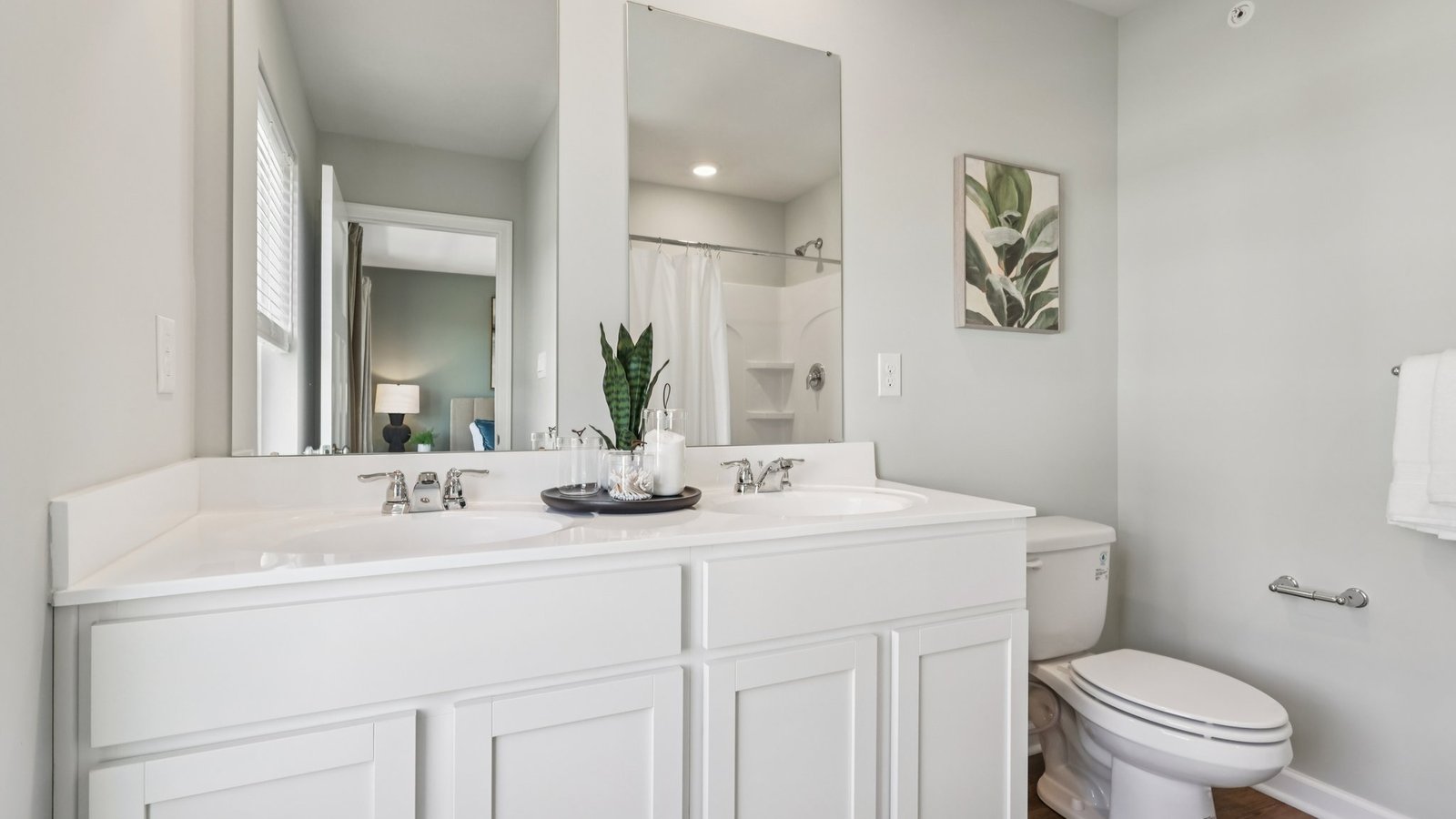 full bathroom with dual vanity