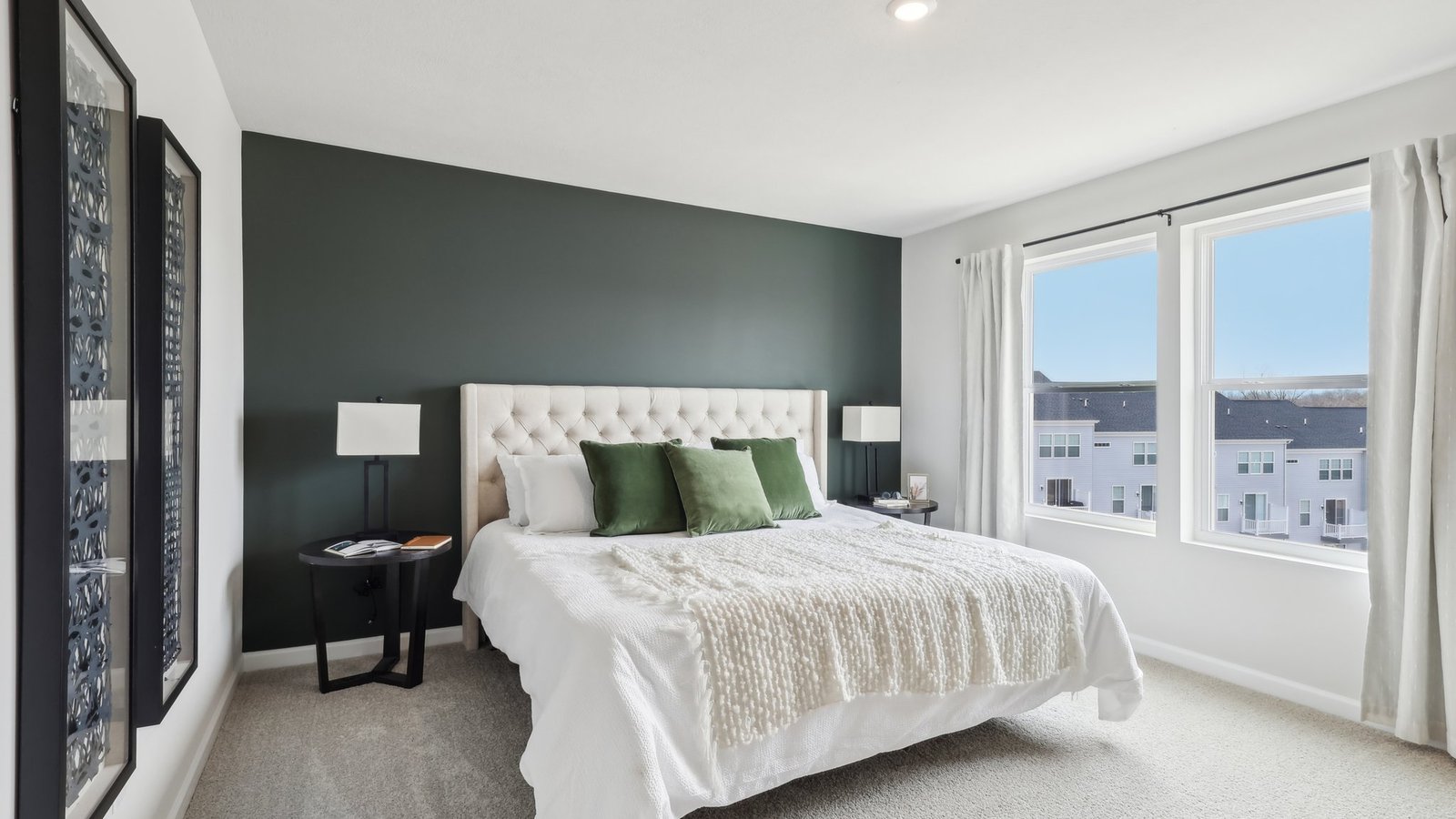 Primary bedroom with large window