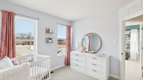 Secondary bedroom w ith large windows