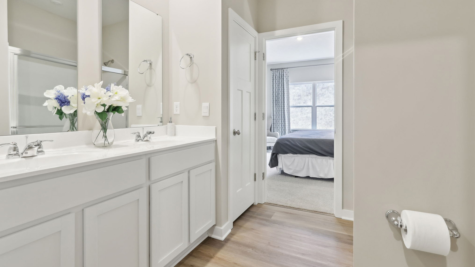 Primary ensuite bathroom with double sinks