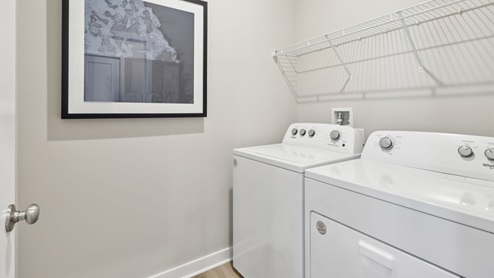 Laundry room with wire shelving