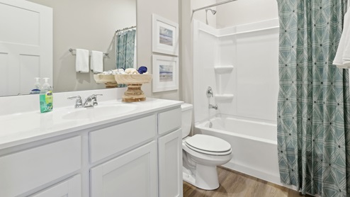 Secondary full bath with tub and shower