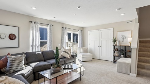 Lower level finished rec room with sliding glass door