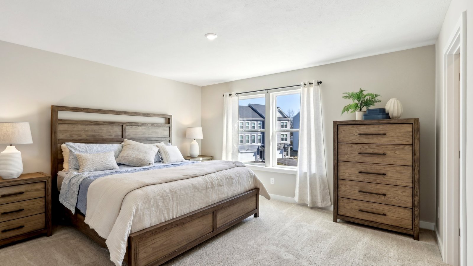 primary suite with large windows