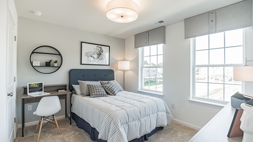 Secondary bedroom with large windows