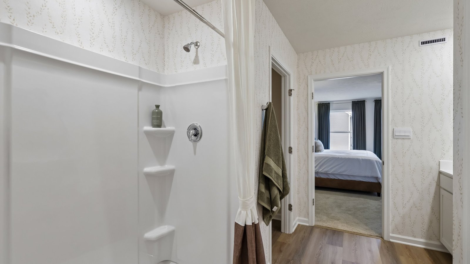 primary suite with walk-in shower