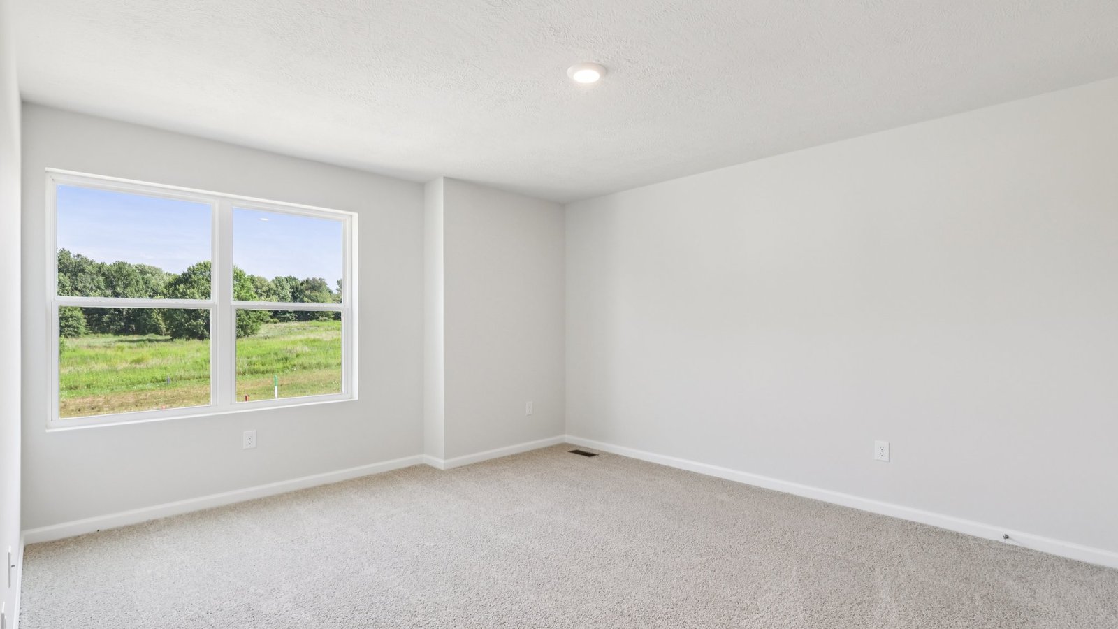 Secondary bedroom with two windows