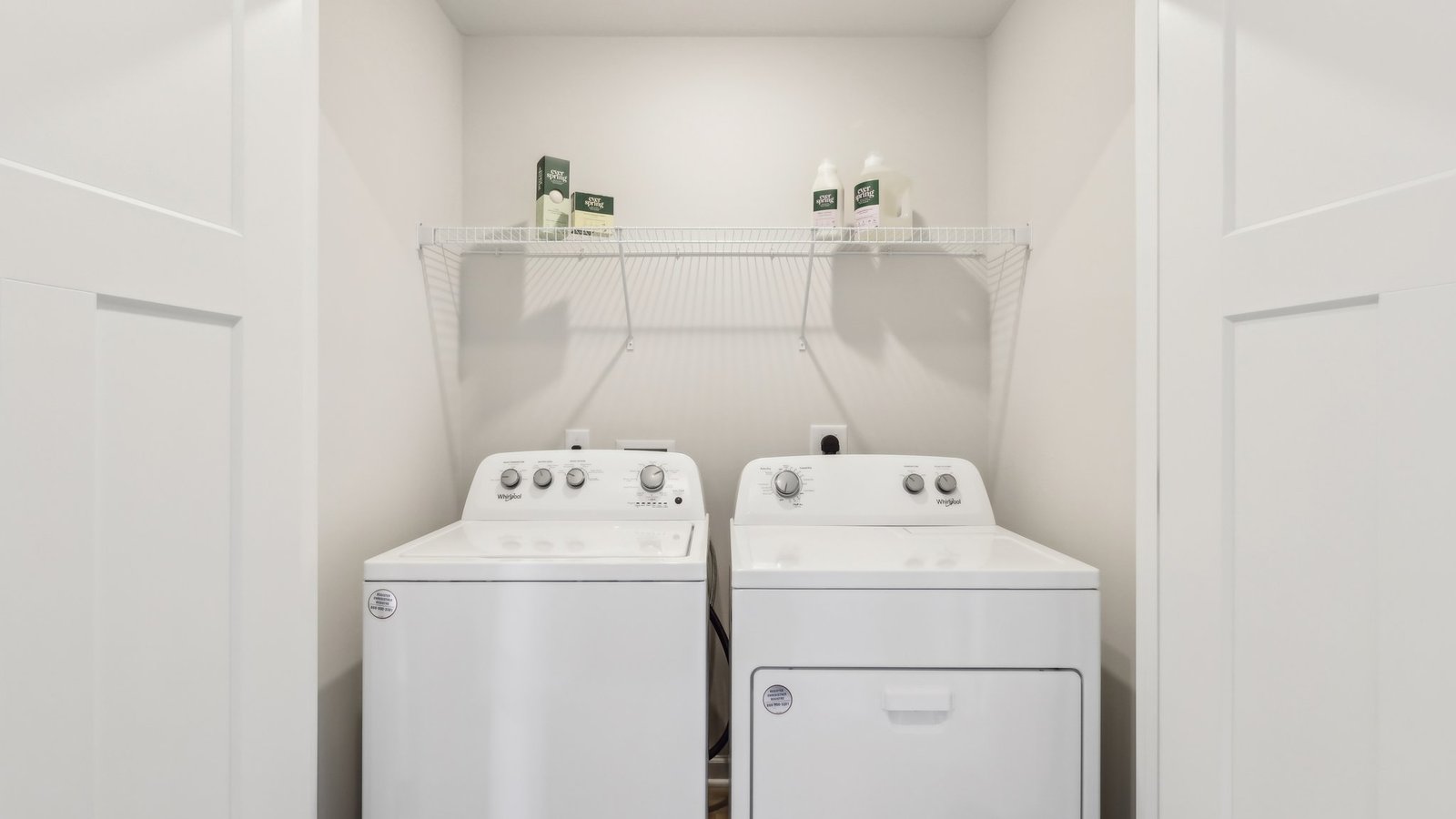 Laundry area with shelves