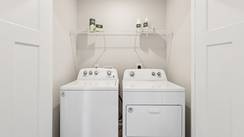 Laundry closet with wire shelving