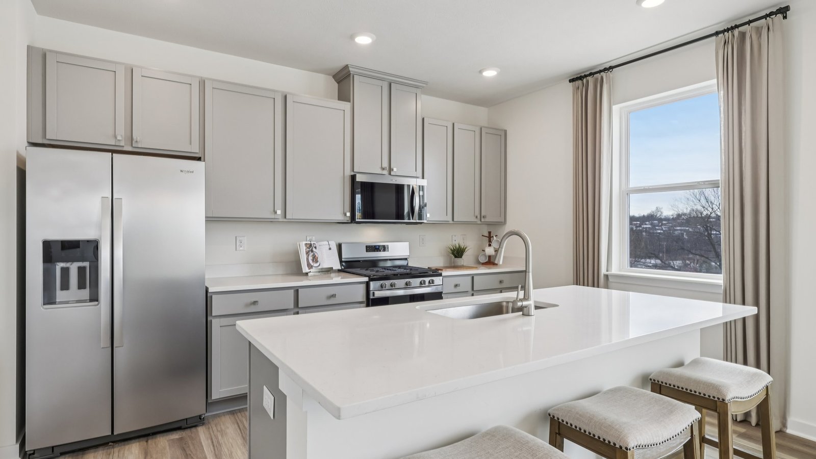 Galen kitchen with island and stainless steel appliances