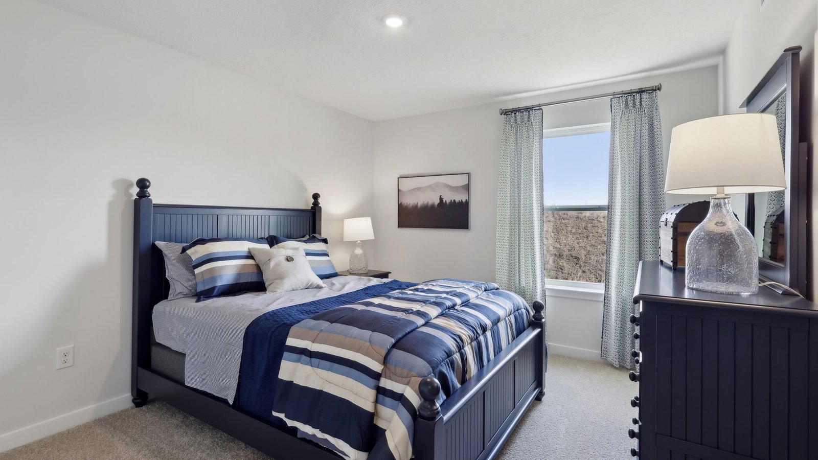 third bedroom with large window