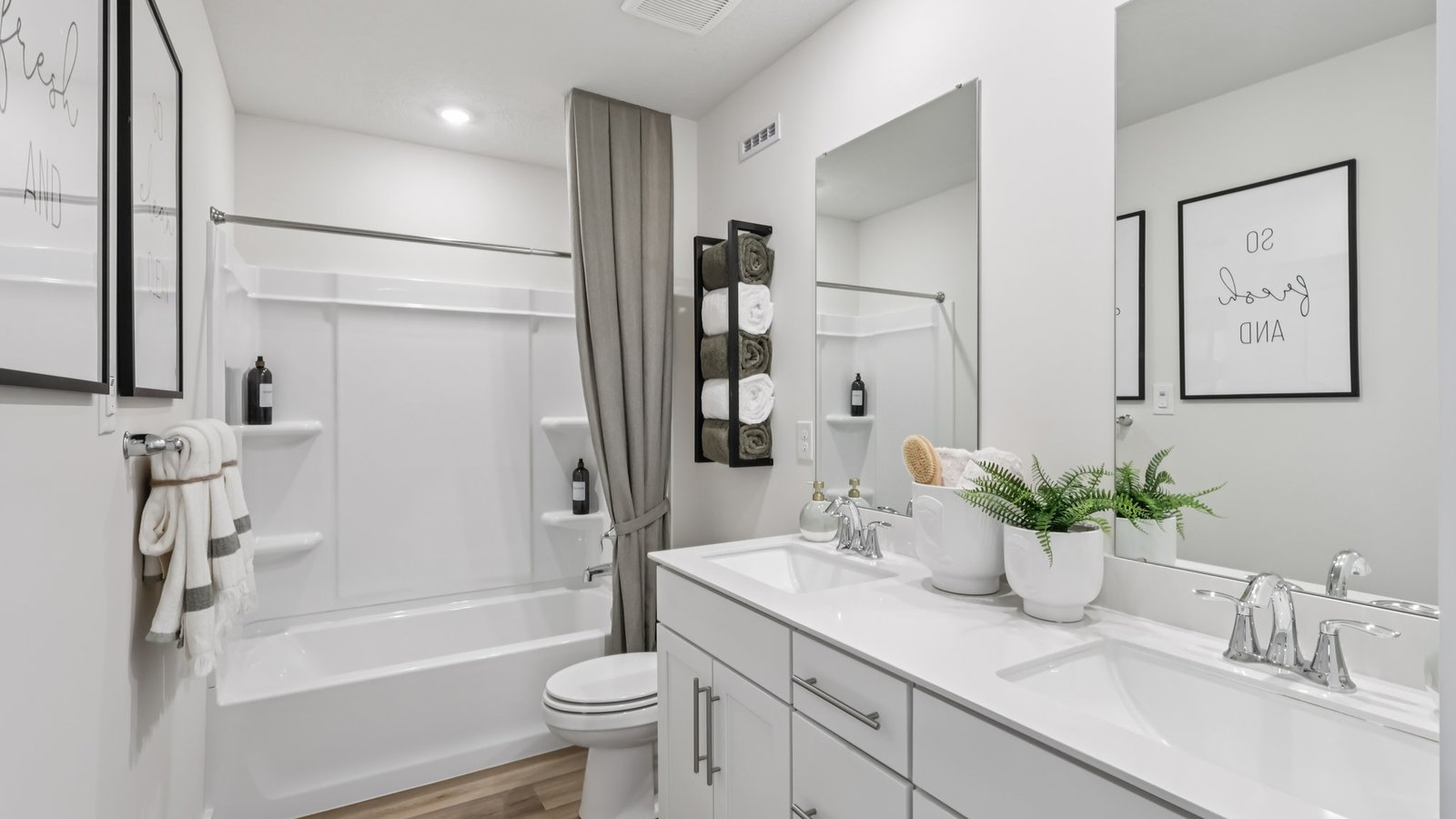 Secondary bathroom with dual vanity