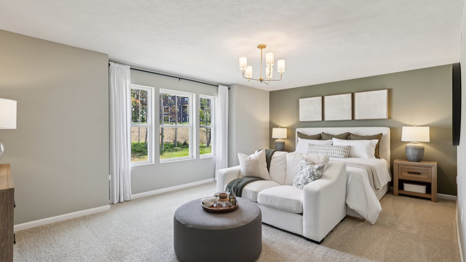 primary suite with large windows