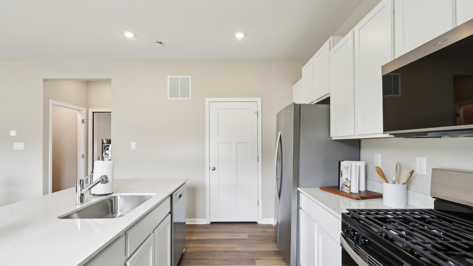 Kitchen with corner pantry