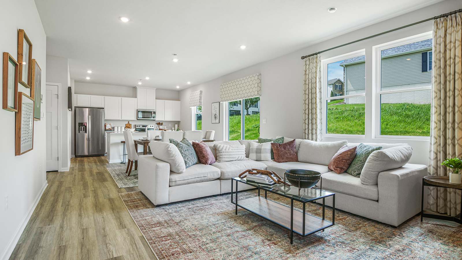 Living room space off of dining and kitchen area