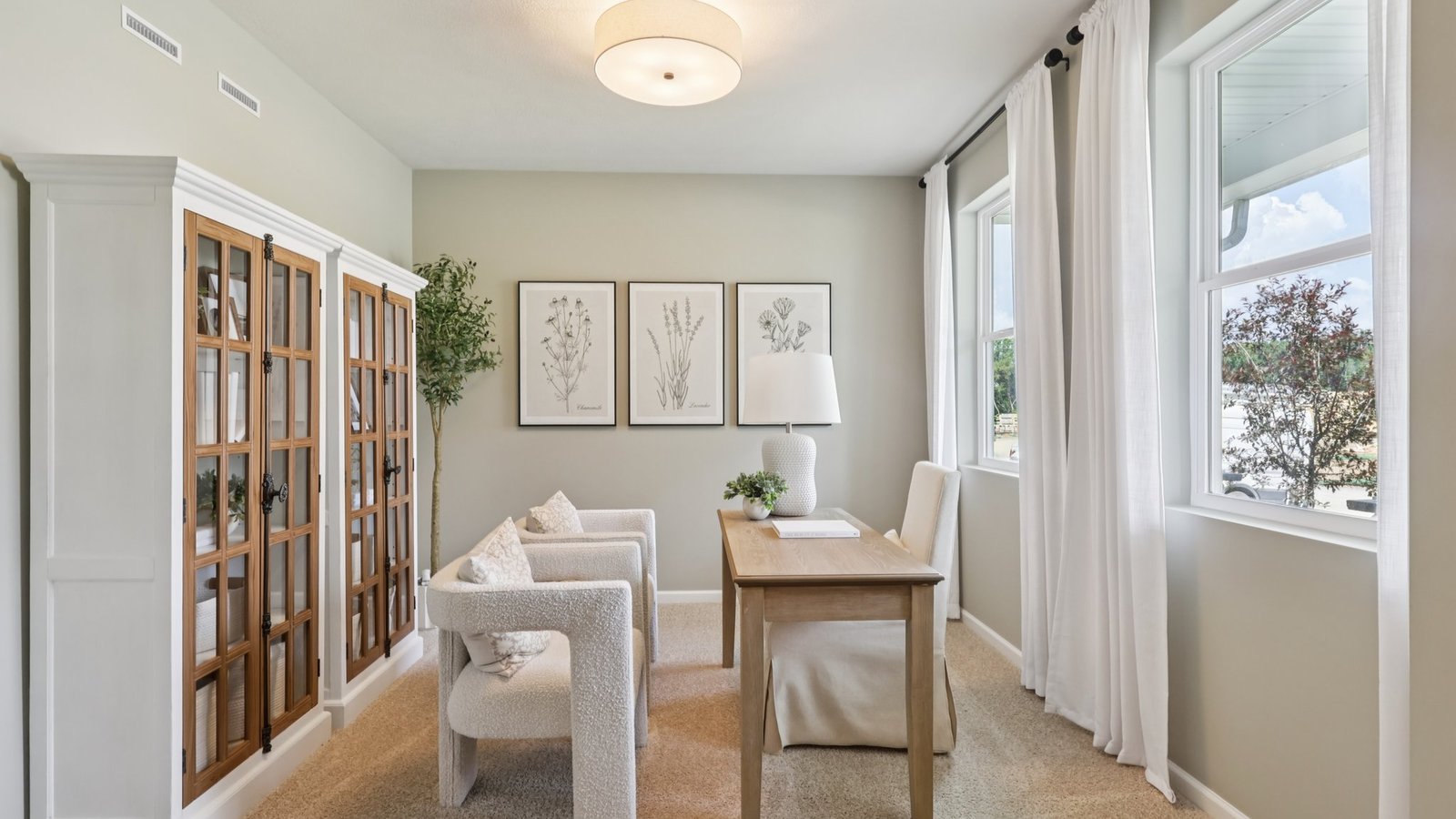 Front flex room with large windows