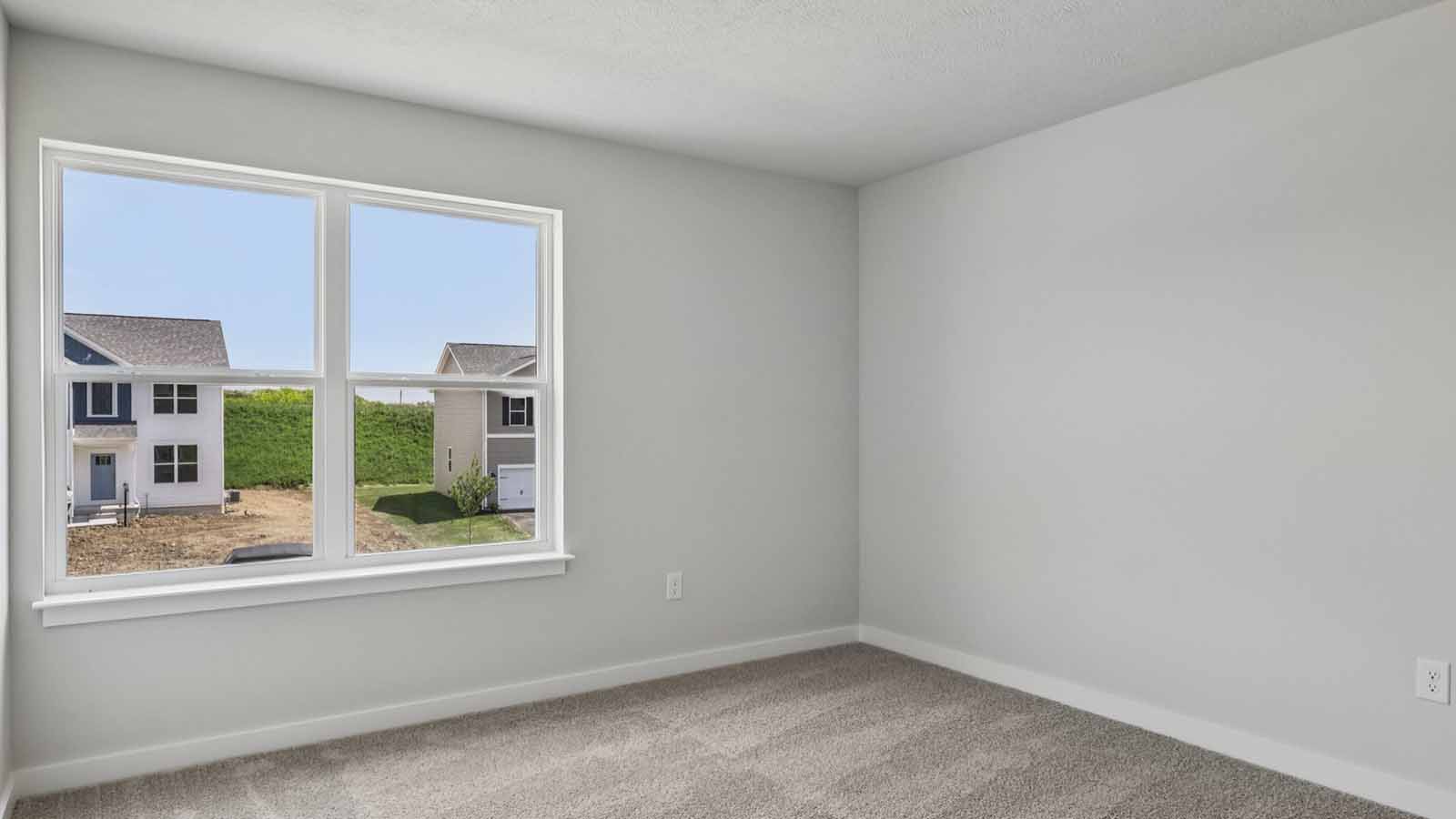 Second bedroom with large window