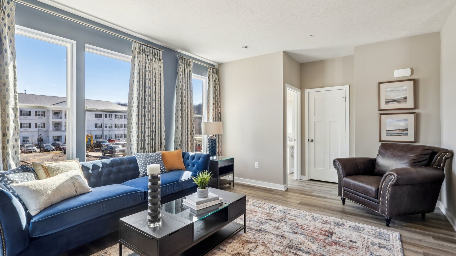 main level living room with large windows