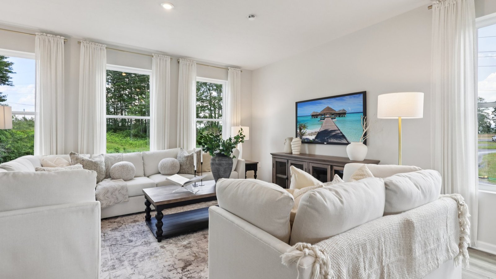 living area with windows