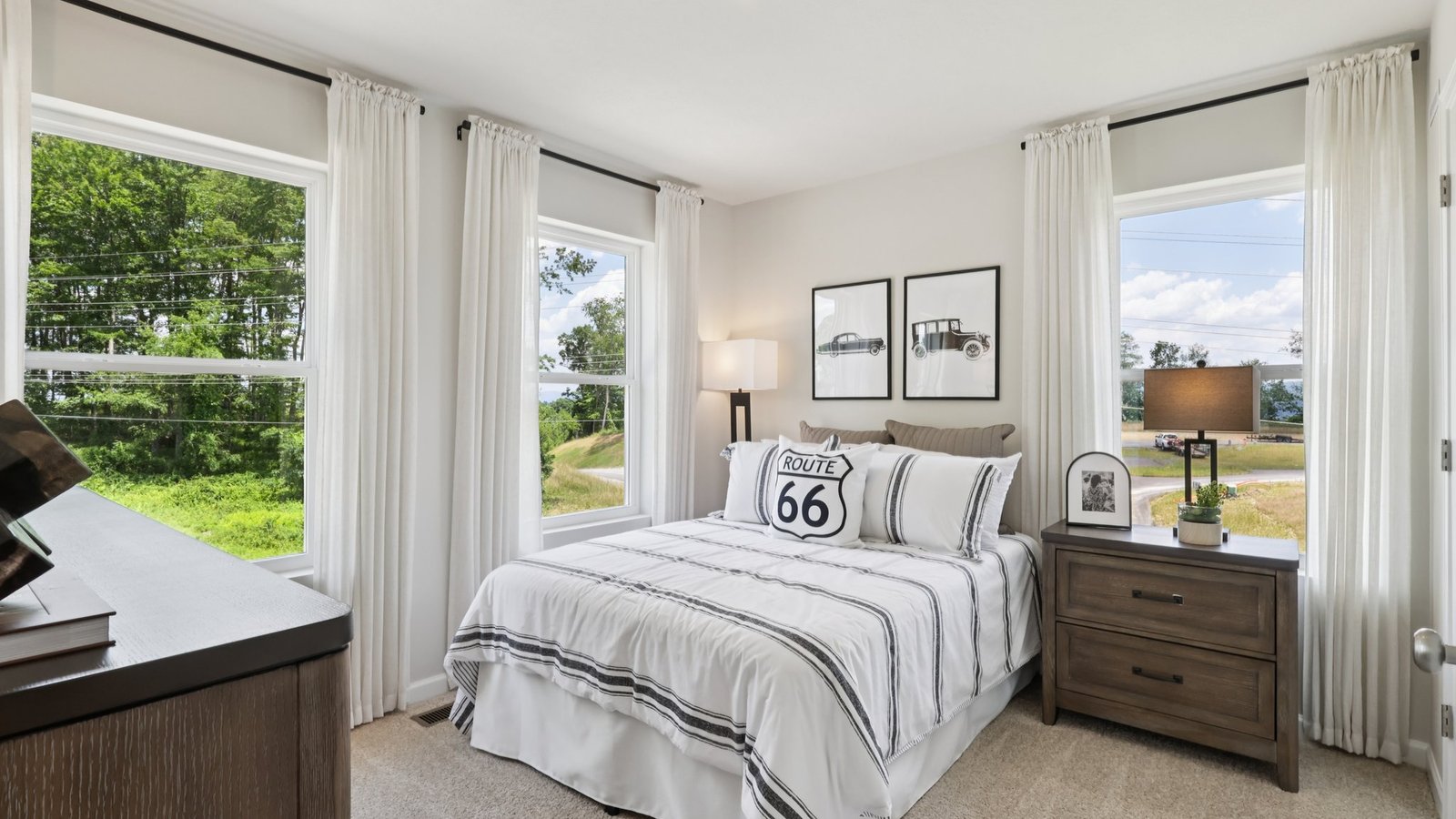 secondary bedroom with large windows