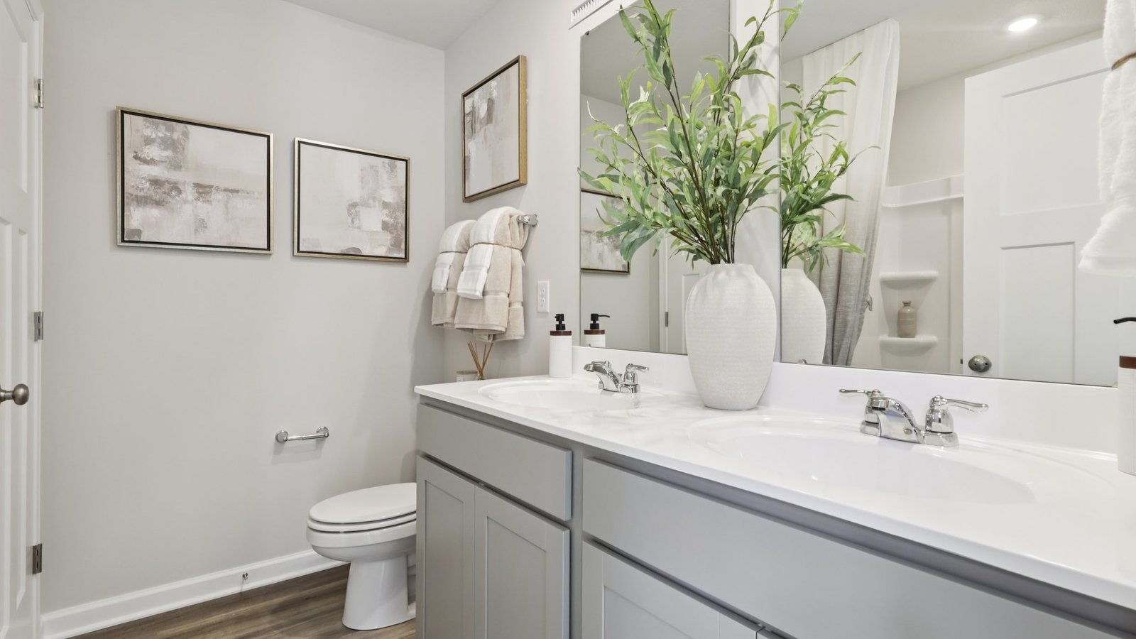 primary en suite with dual vanities