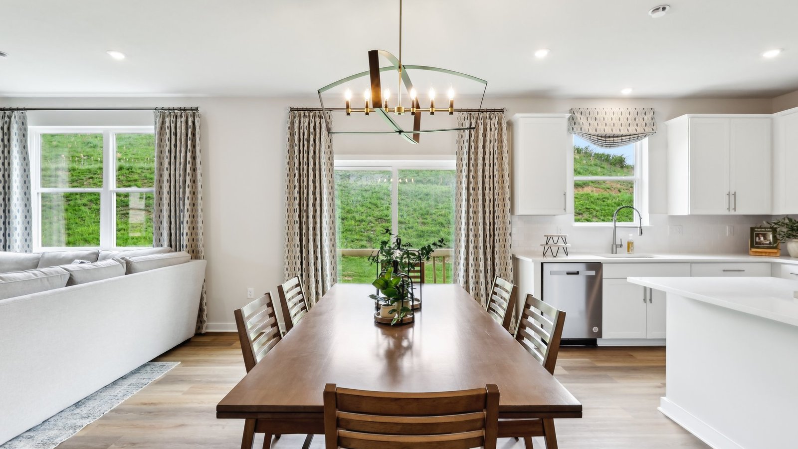 dining table between living room and kitchen