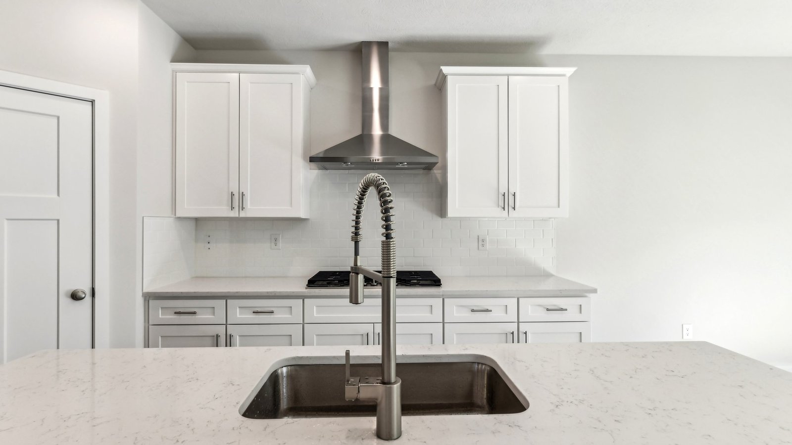kitchen island with white cabinets