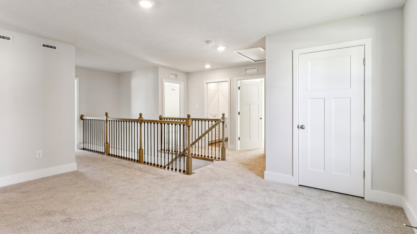 Second level loft area with exposed hand rail