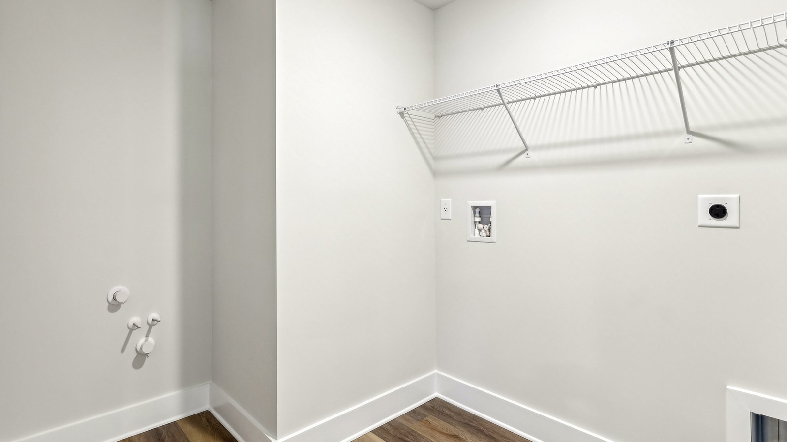 Second floor laundry room with wire shelving