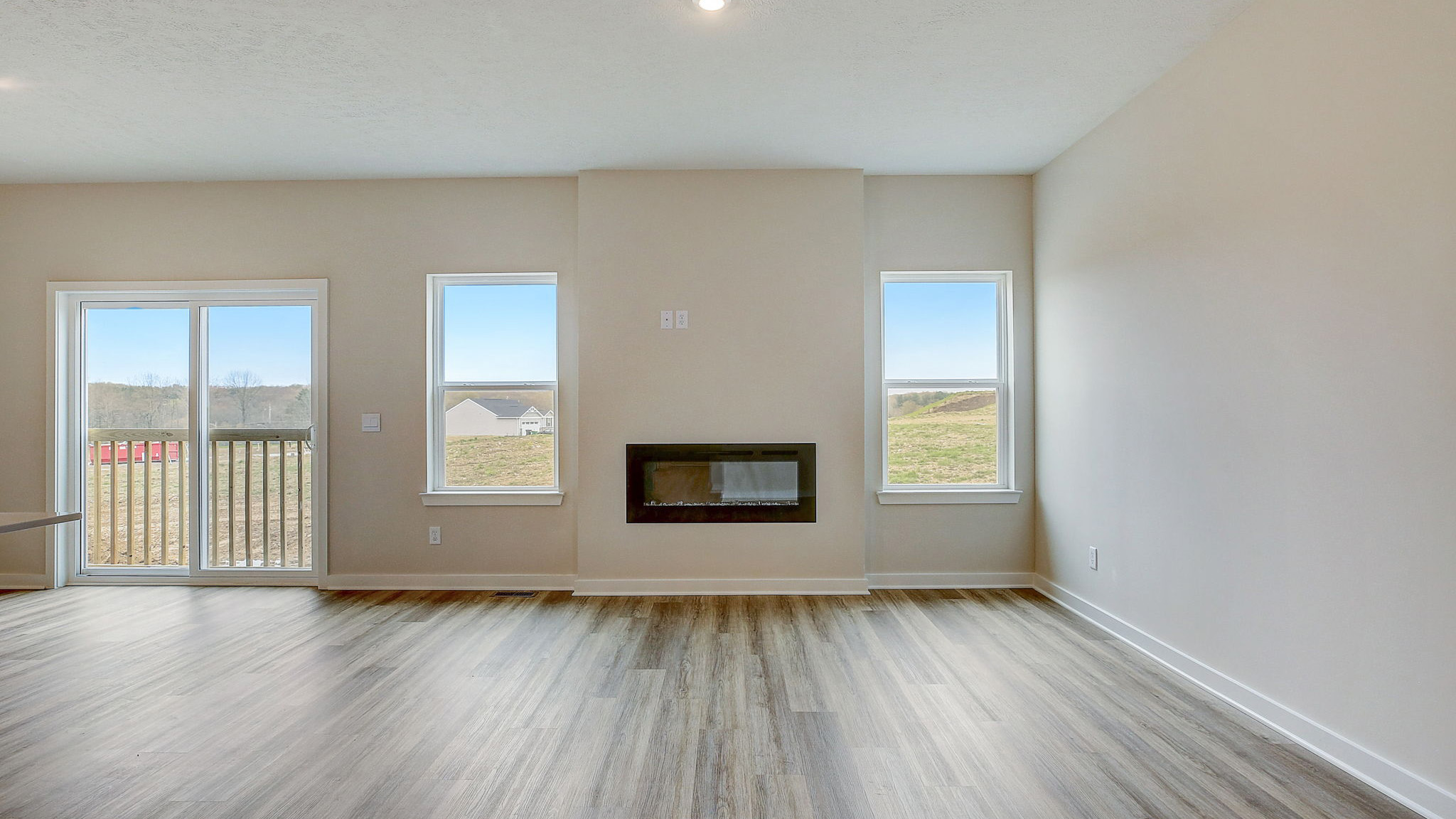 main living area with electric fireplace